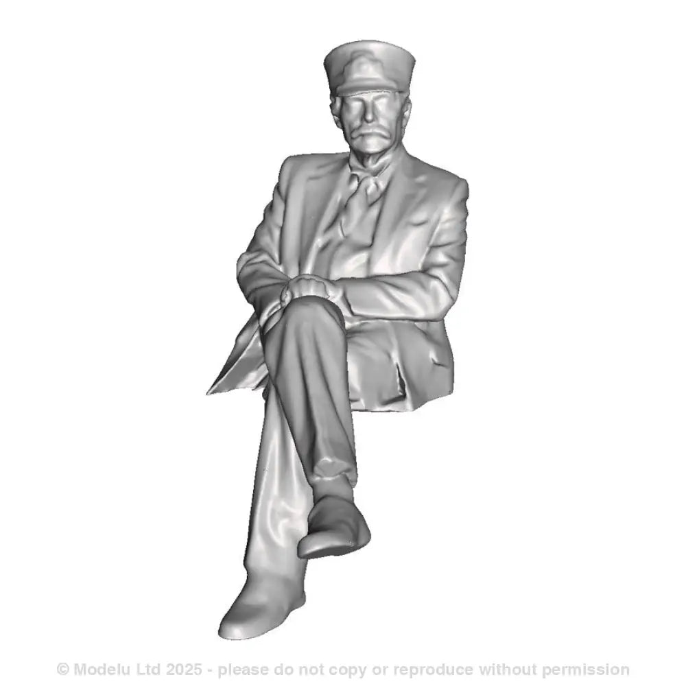 A station master seated
