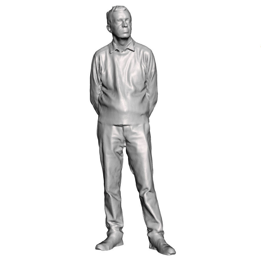 A male figure with hands behind back