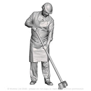 A workman with a broom