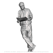 A male figure leaning with newspaper