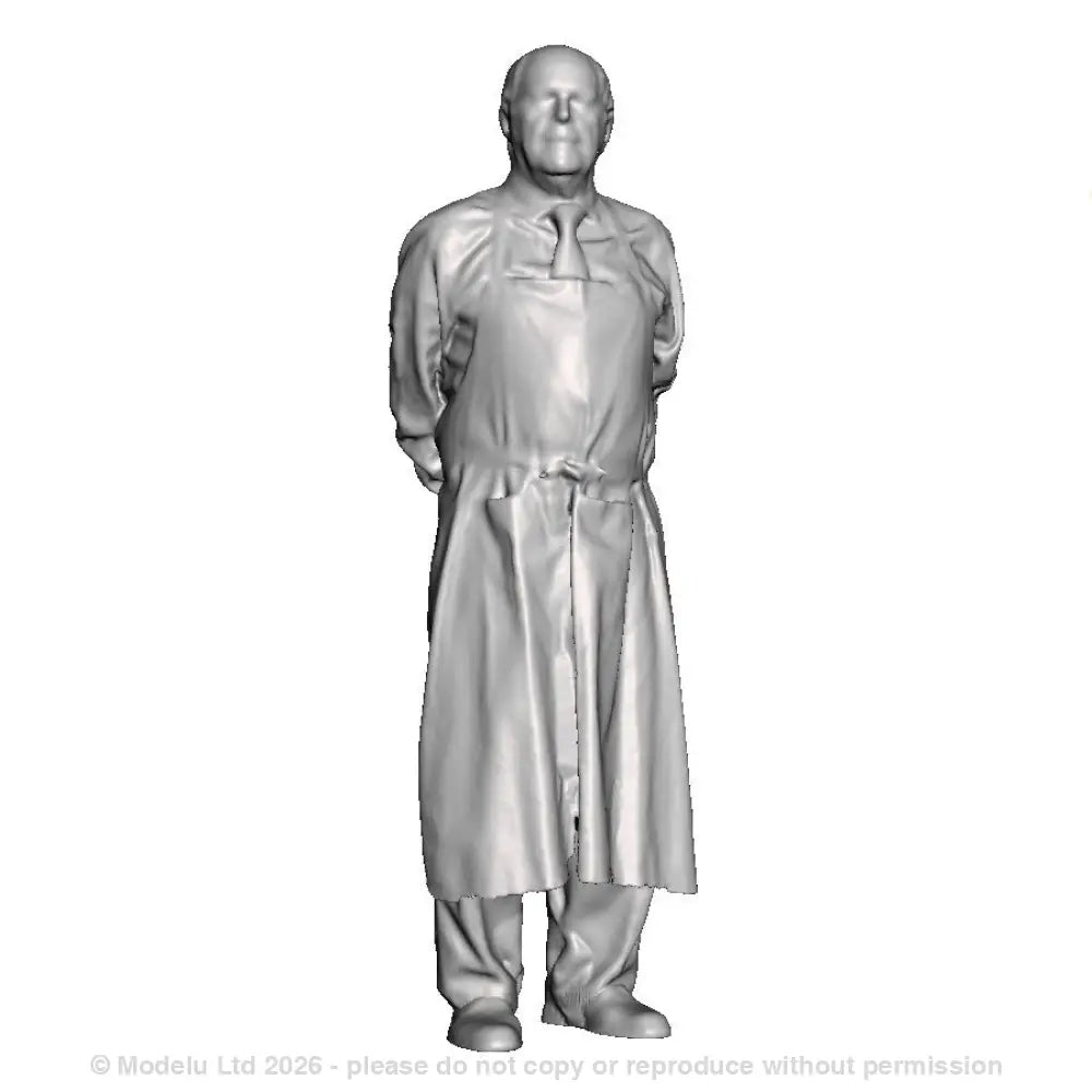 A shopkeeper with hands clasped behind back