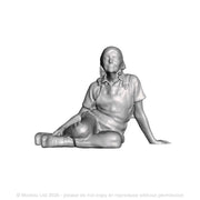 A female farm worker at rest