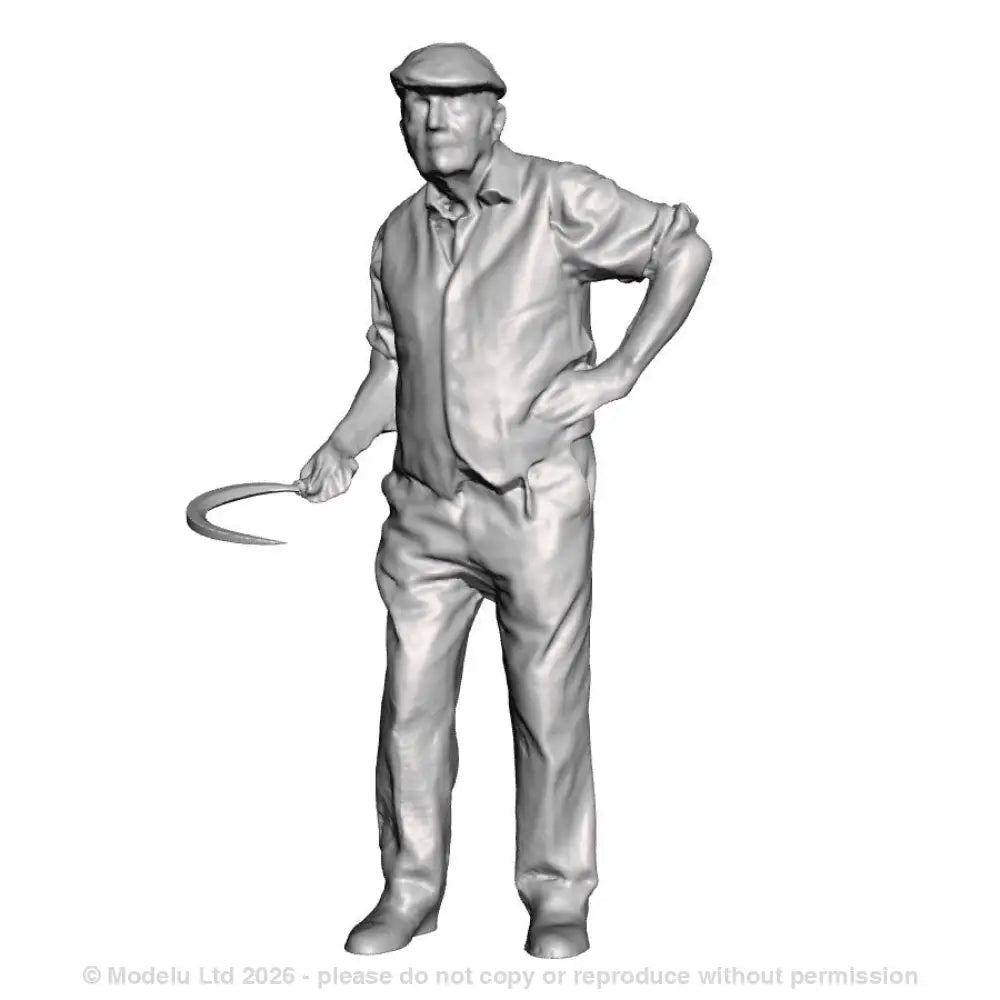 A male gardener with sickle