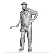 A male gardener with sickle