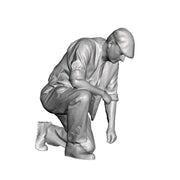 0148 Man kneeling
