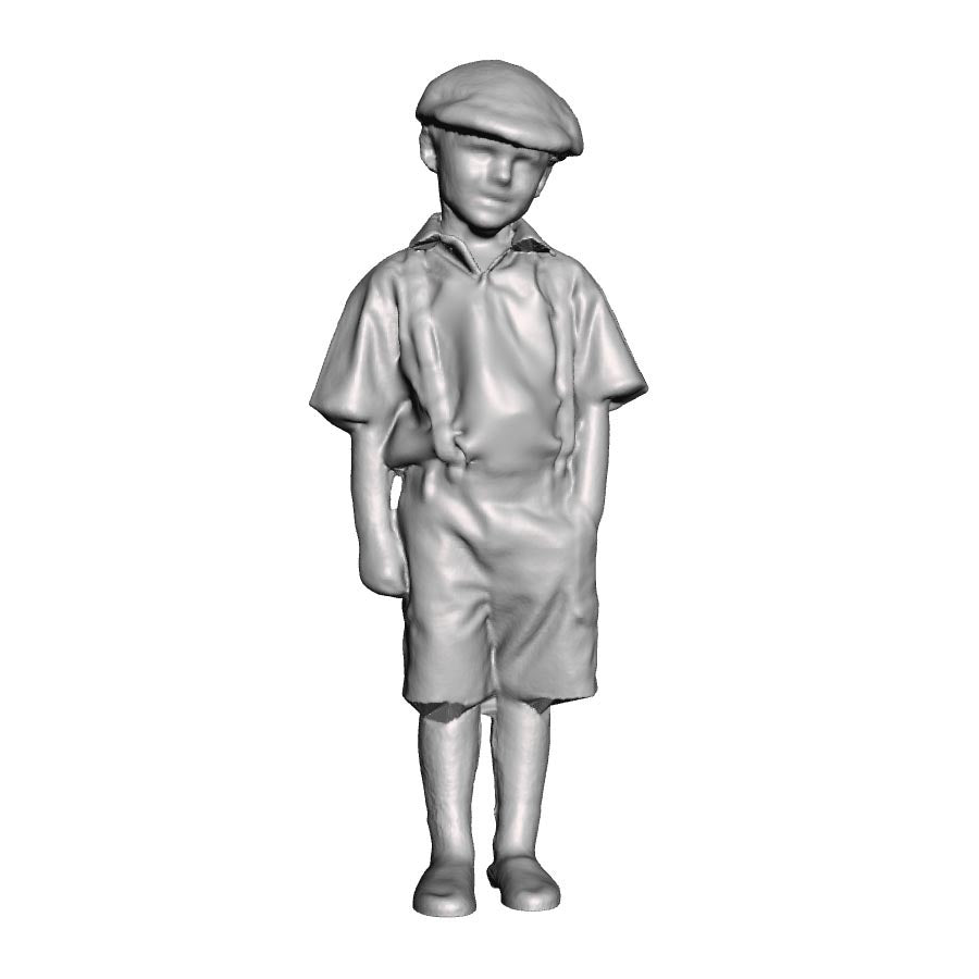 A boy with hands in pockets