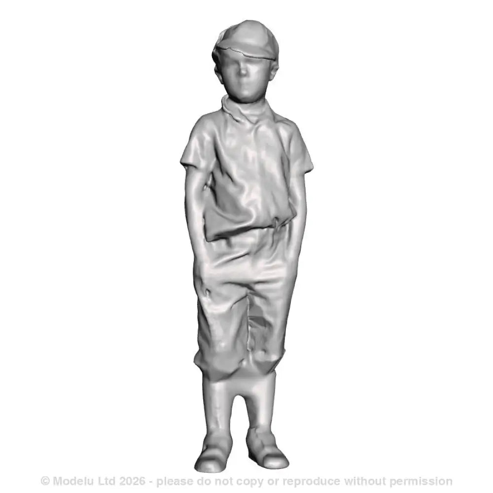 A boy with hands in pockets