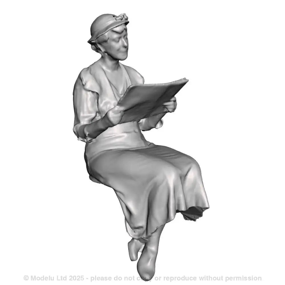 A seated woman reading a newspaper