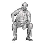 A seated man