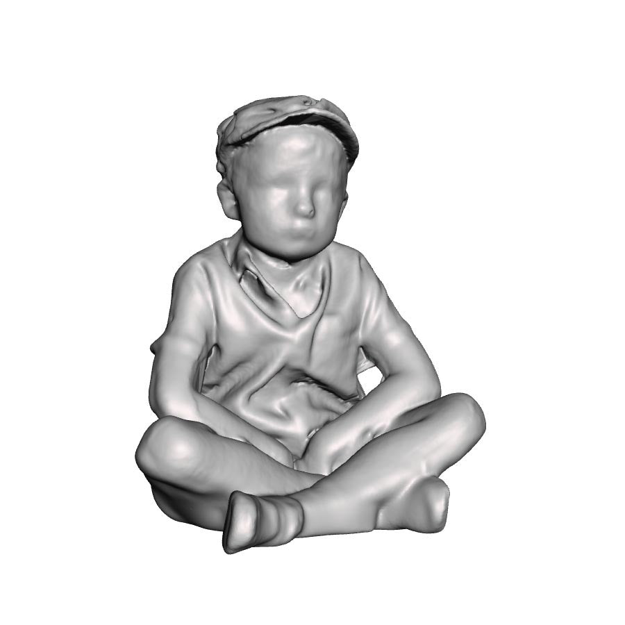 A boy sat cross legged