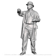 A loco driver wearing a bowler hat operating a regulator