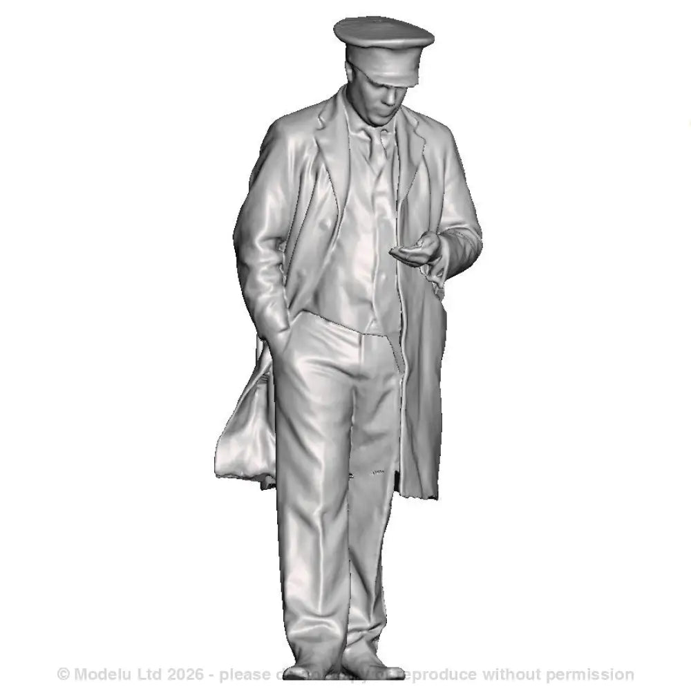 A guard or sttation master inspecting his pocket watch