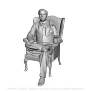 A signalman seated in an armchair