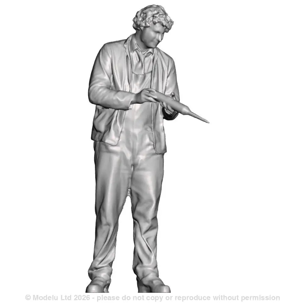 A loco crew man oiling with a gravity feeder