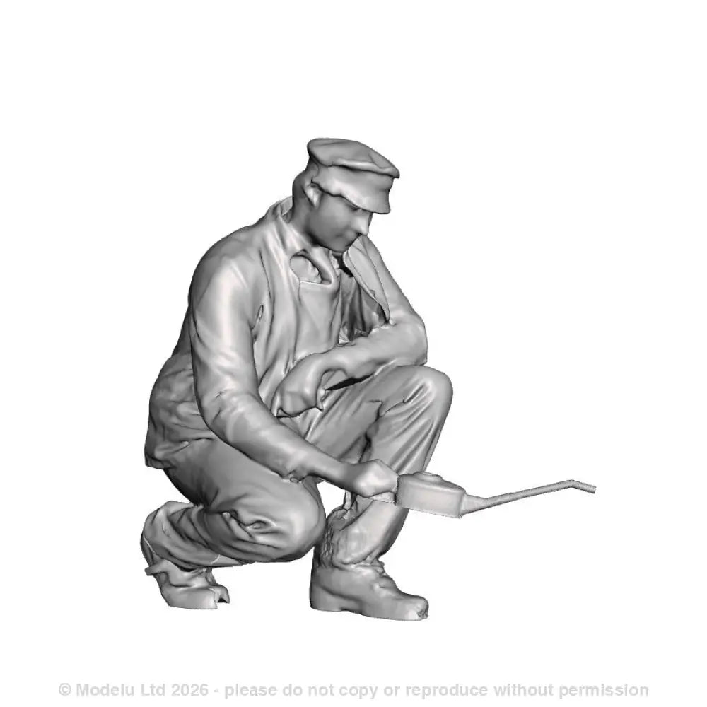 A loco crew man oiling