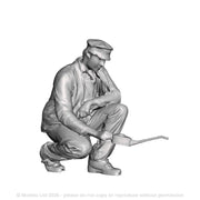 A loco crew man oiling