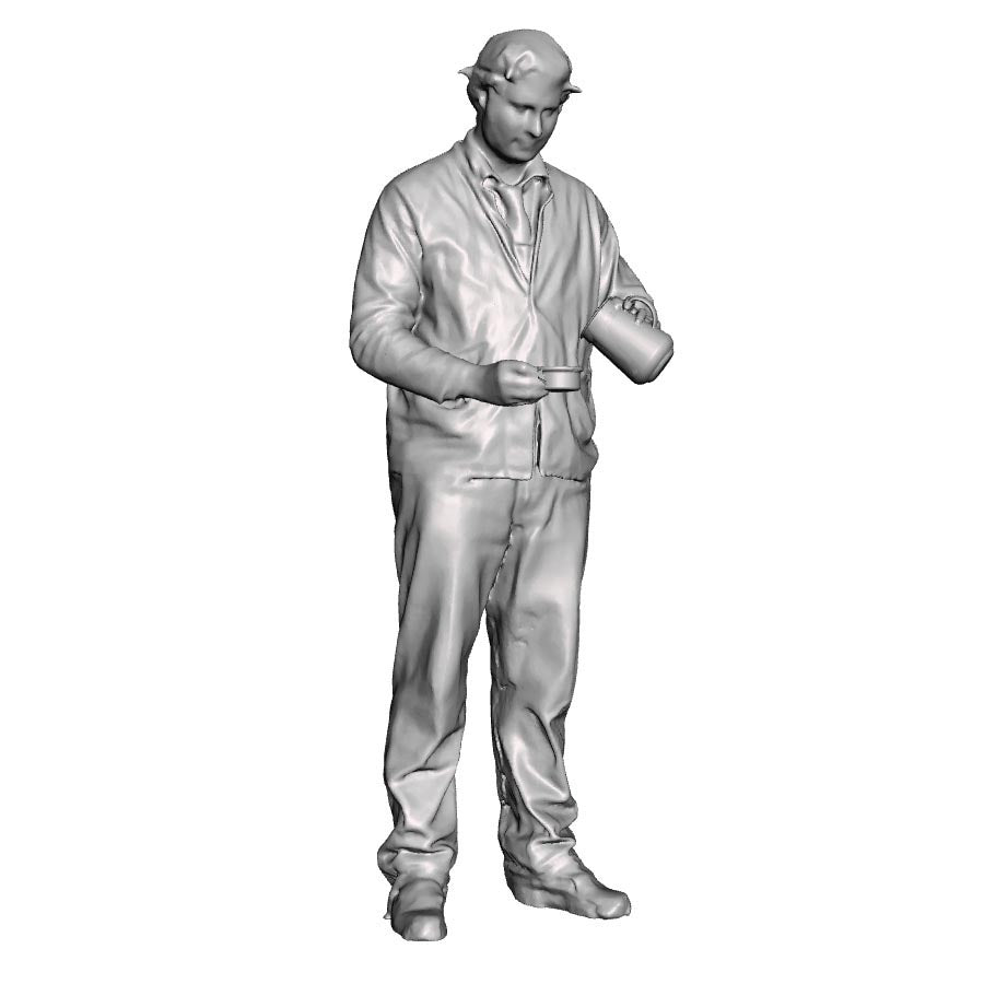 A loco crew man pouring a billy can