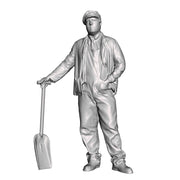A fireman with firing shovel