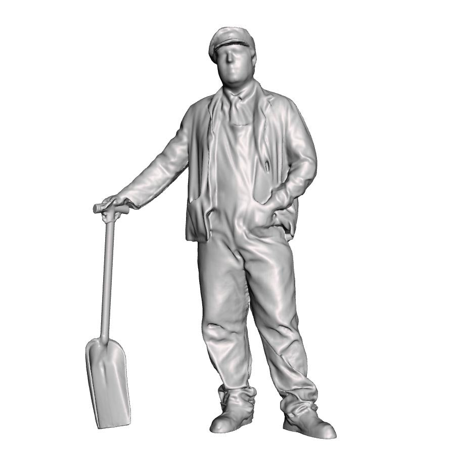 A fireman with firing shovel