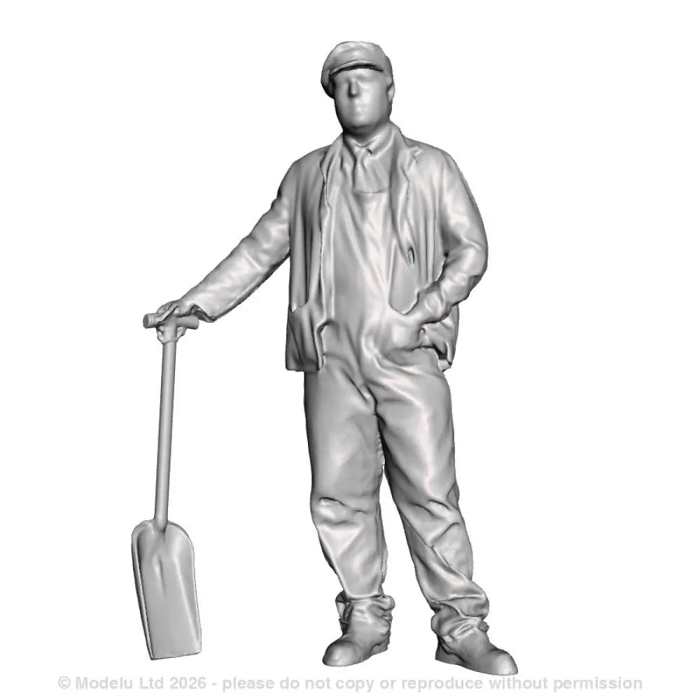 A fireman with firing shovel