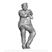 A loco driver seated operating a reverser