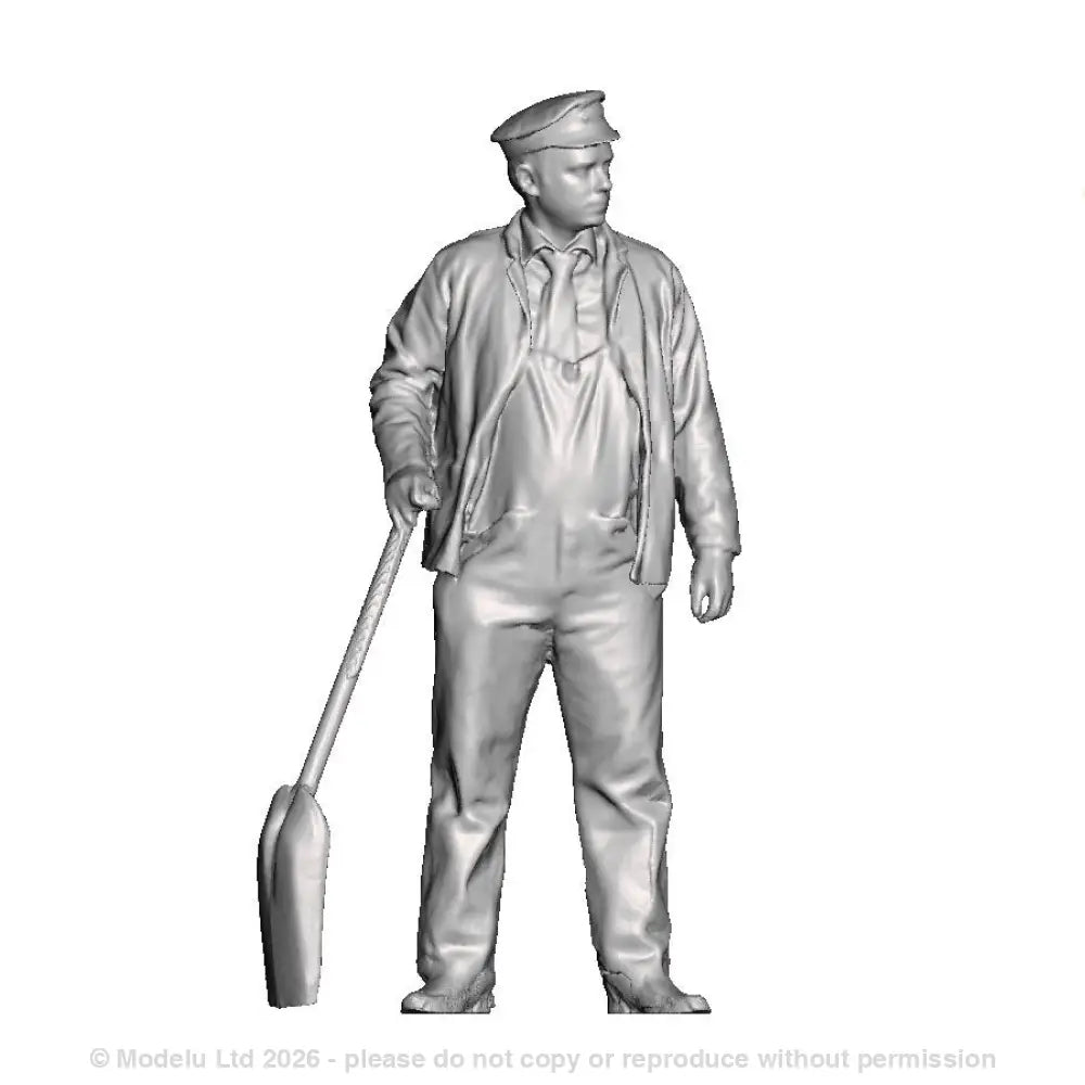 A fireman with firing shovel