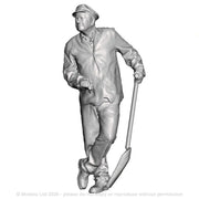 A fireman leaning holding a firing shovel