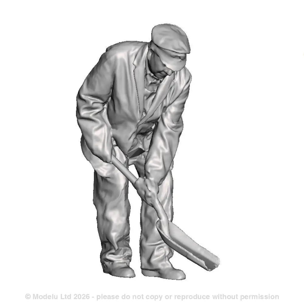 A fireman using a firing shovel in a small cab