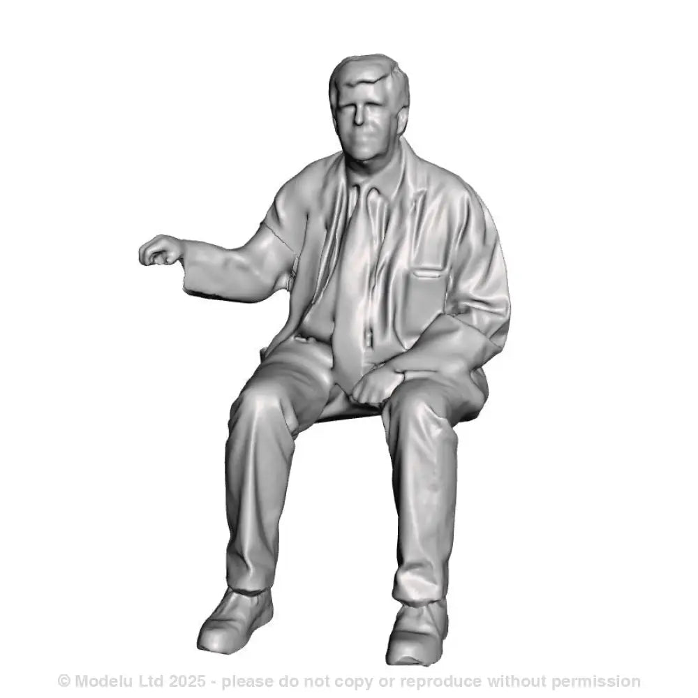 A loco driver seated operating a regulator