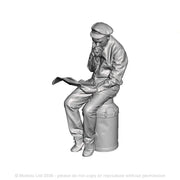 A porter reading newspaper