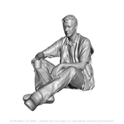 A loco crew man seated with drink