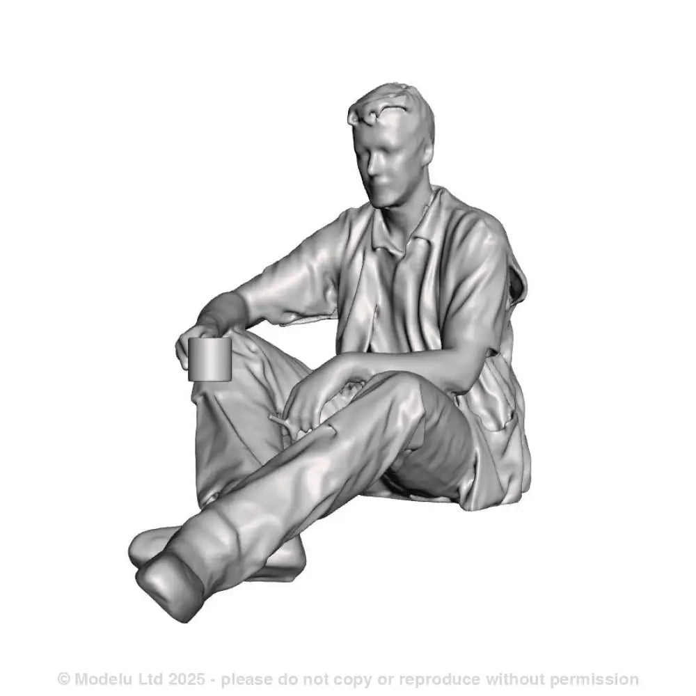 A loco crew man seated with drink