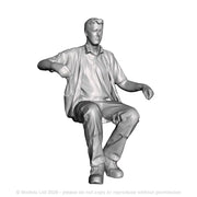 A loco driver seated