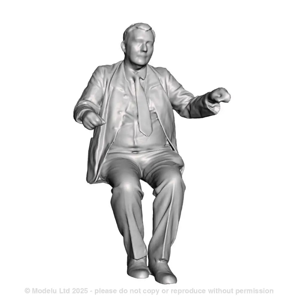 A loco driver seated operating a regulator