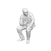 A shed worker eating