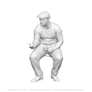 A shed worker eating