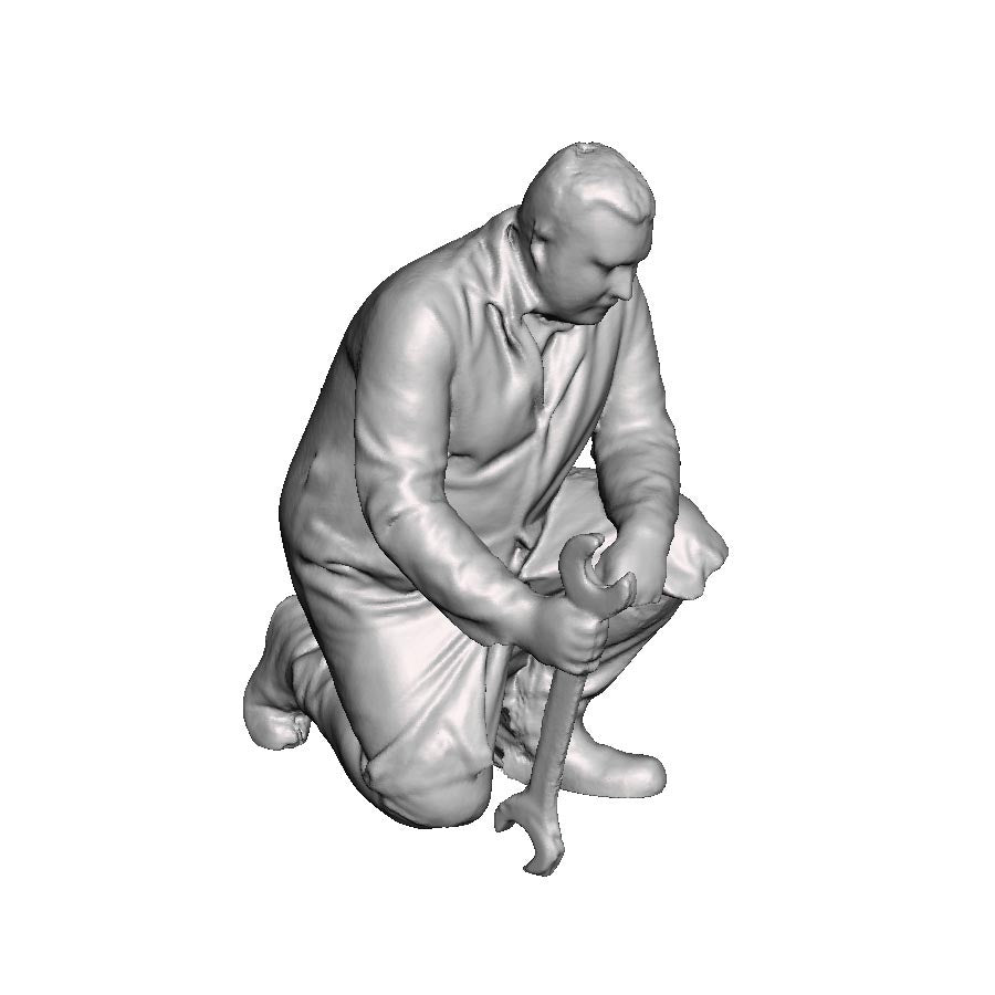A fitter kneeling with spanner