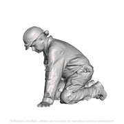 An engineer kneeling