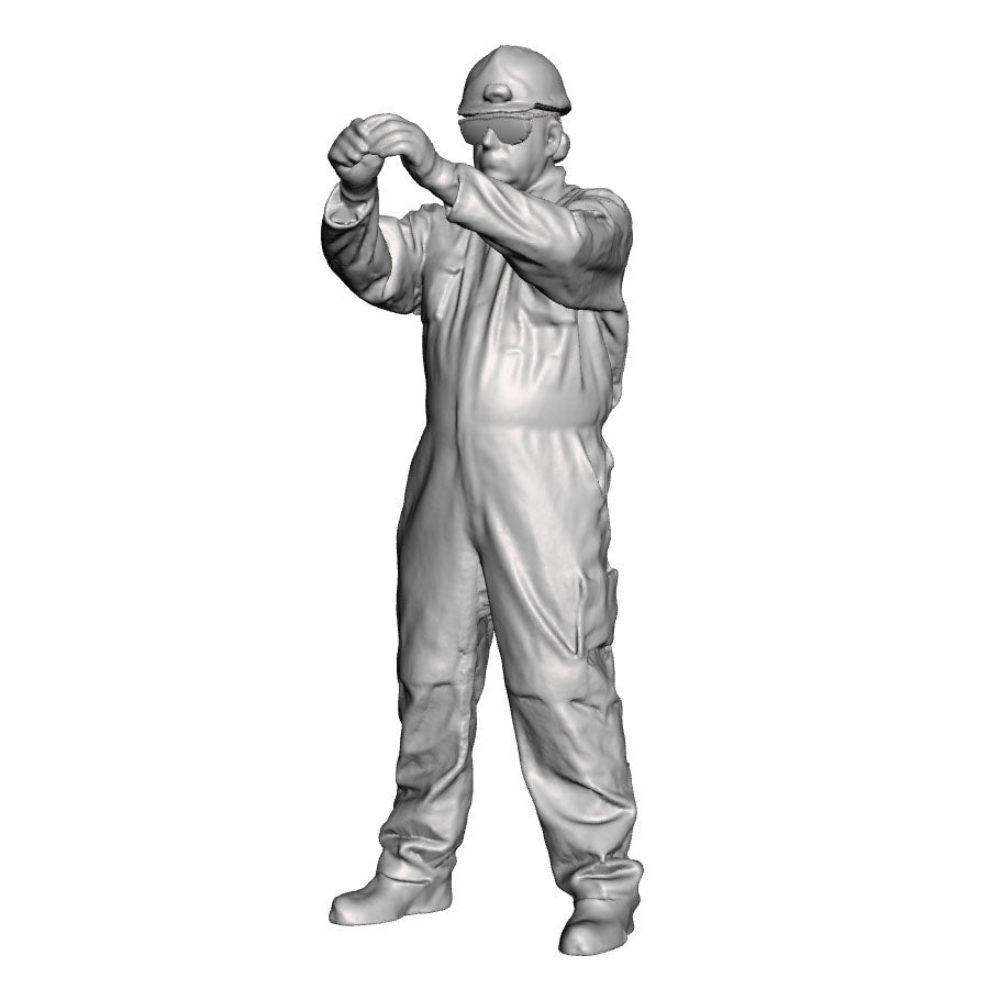 An engineer working in a cabinet