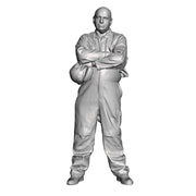 An engineer with arms folded