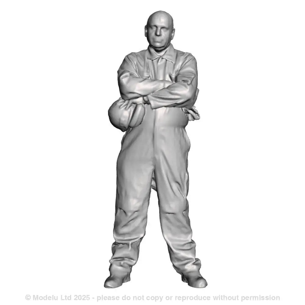 An engineer with arms folded