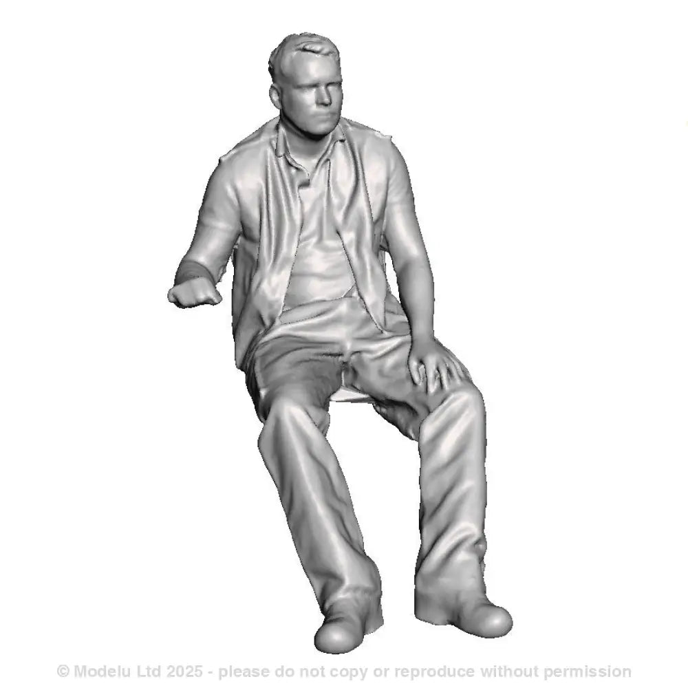 A loco driver seated operating a regulator