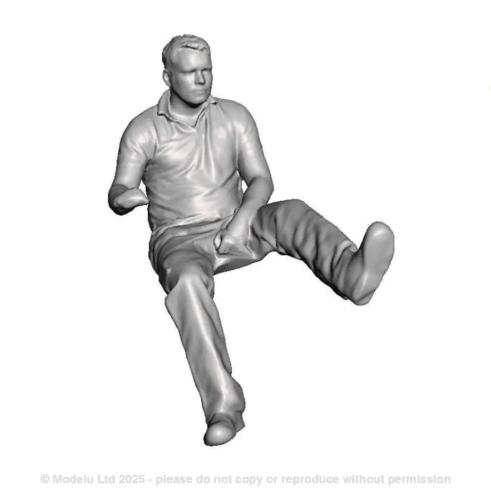 A loco driver seated operating a regulator