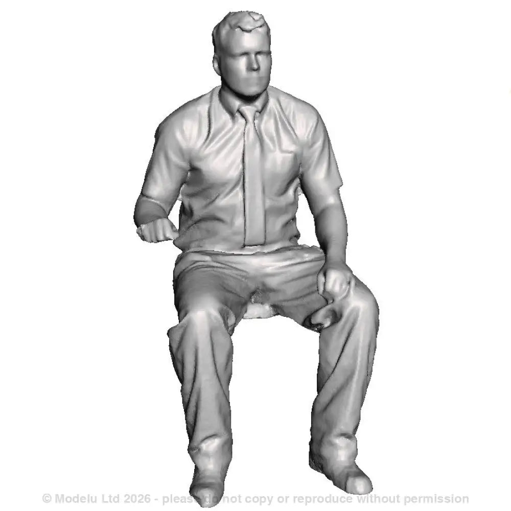 A loco driver seated operating a regulator