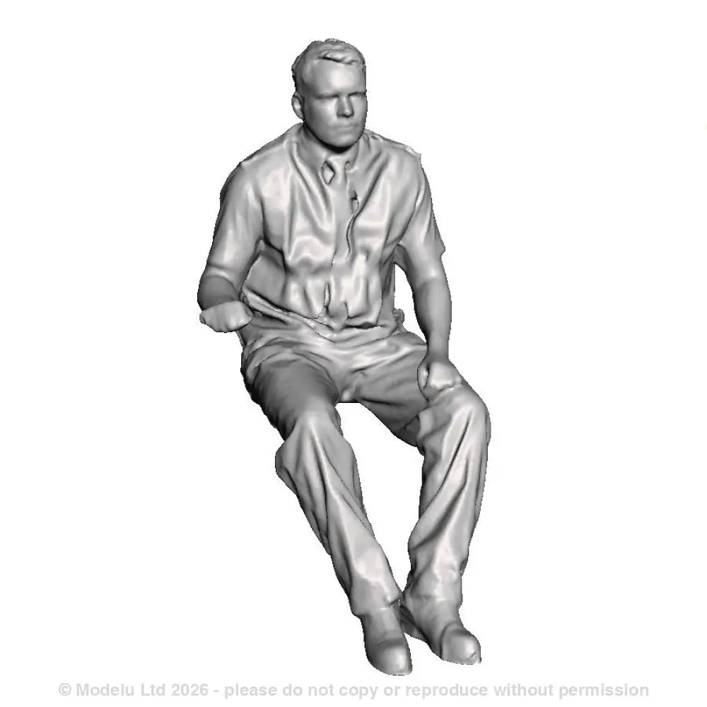 A loco driver seated operating a regulator