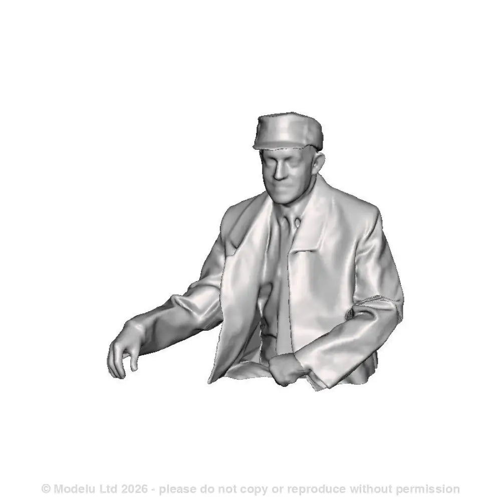 A loco driver seated operating a regulator