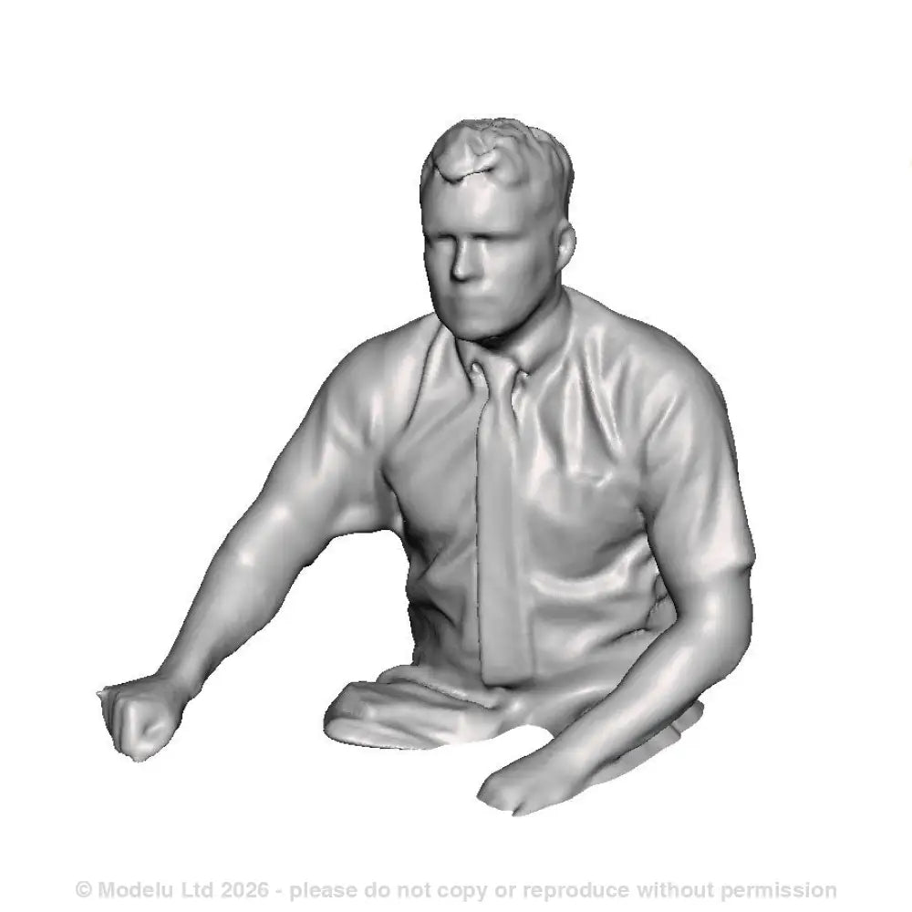 A loco driver seated operating a regulator