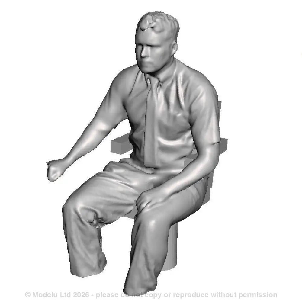 A loco driver seated operating a regulator