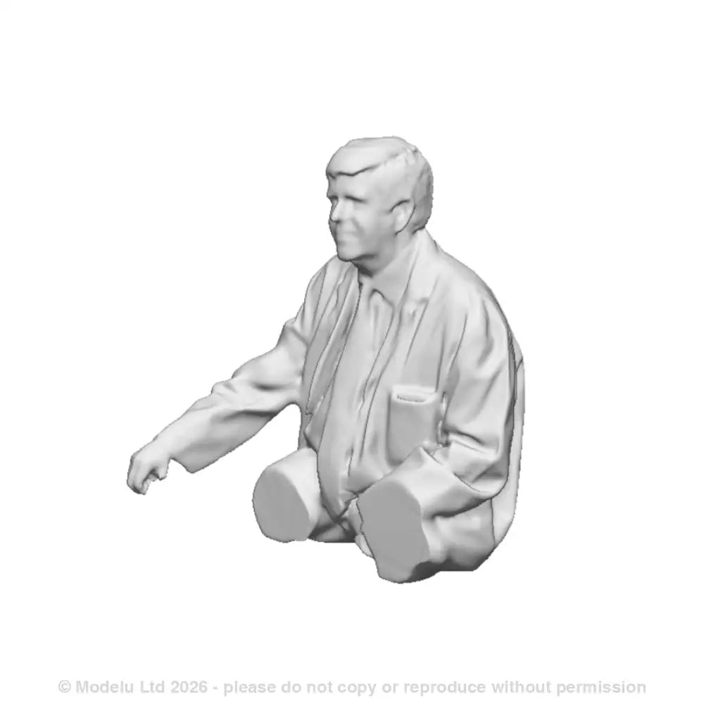 A loco driver seated operating a regulator