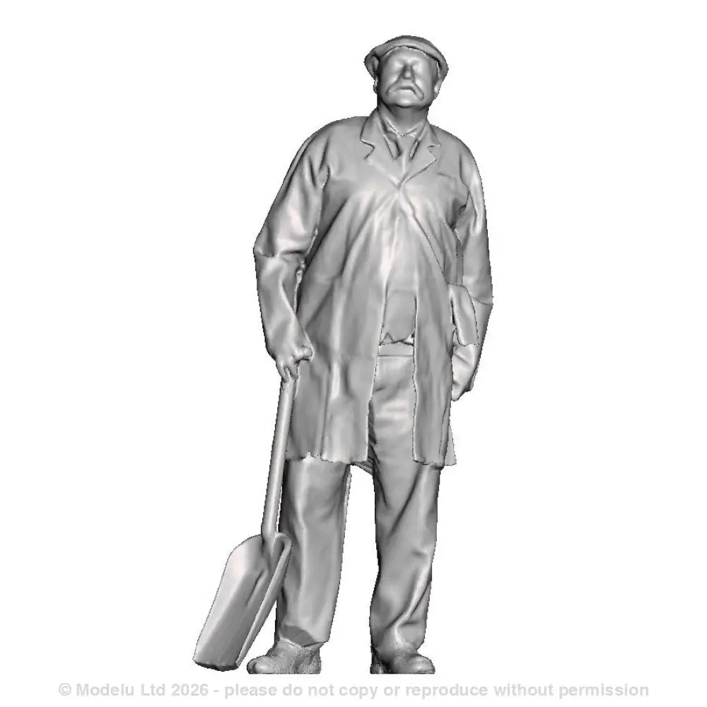 A fireman with firing shovel